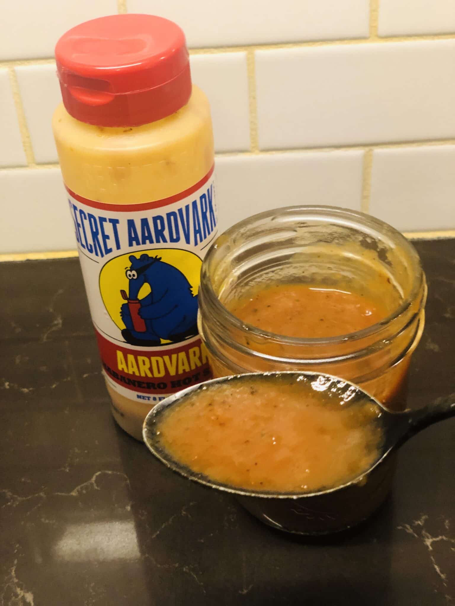Secret Aardvark Habanero Hot Sauce on spoon