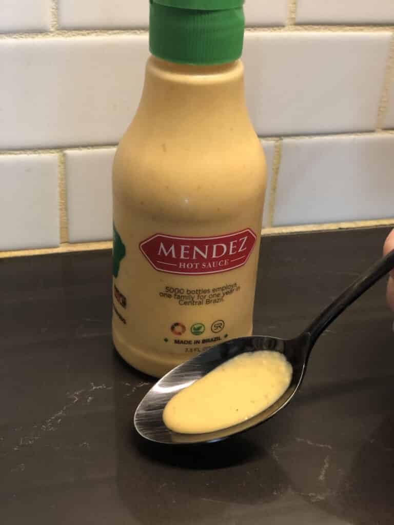 Mendez Hot Sauce on spoon