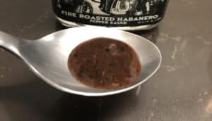 Dr. Assburn’s Fire Roasted Habanero Pepper Sauce on a spoon_cover