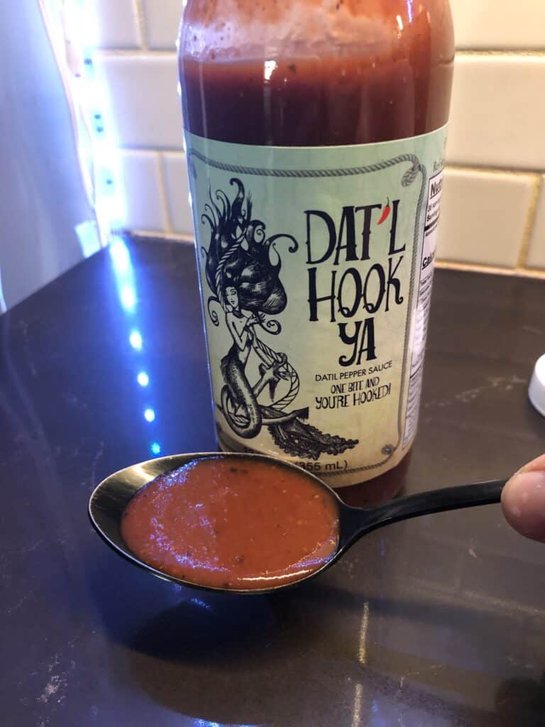 Dat’l Hook Ya Datil Pepper Sauce on a spoon