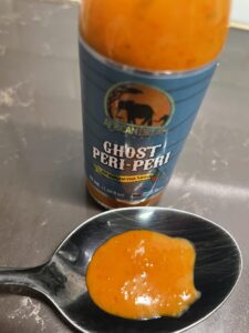 African Dream Foods Ghost Peri-Peri Sauce on a spoon