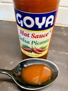Goya Hot Sauce Salsa Picante on a spoon