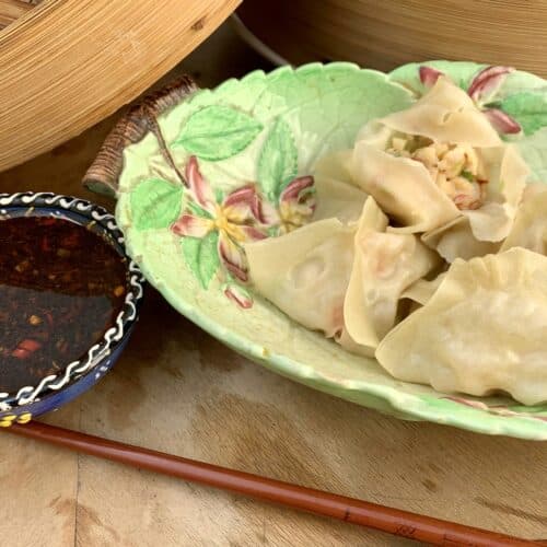 Steamed shrimp dumplings with fiery dipping sauce