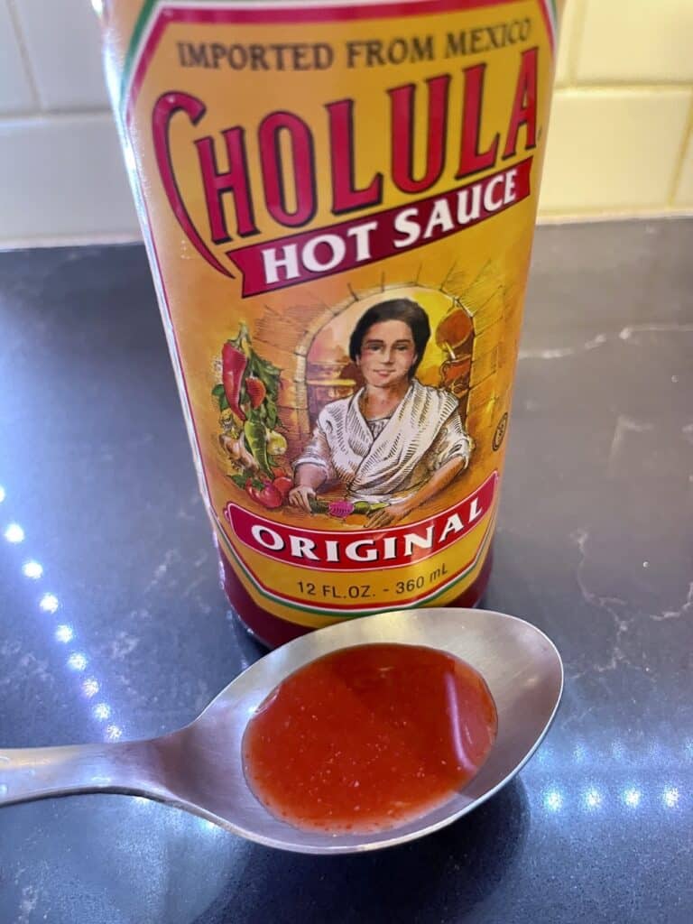 Cholula Original Hot Sauce on a spoon