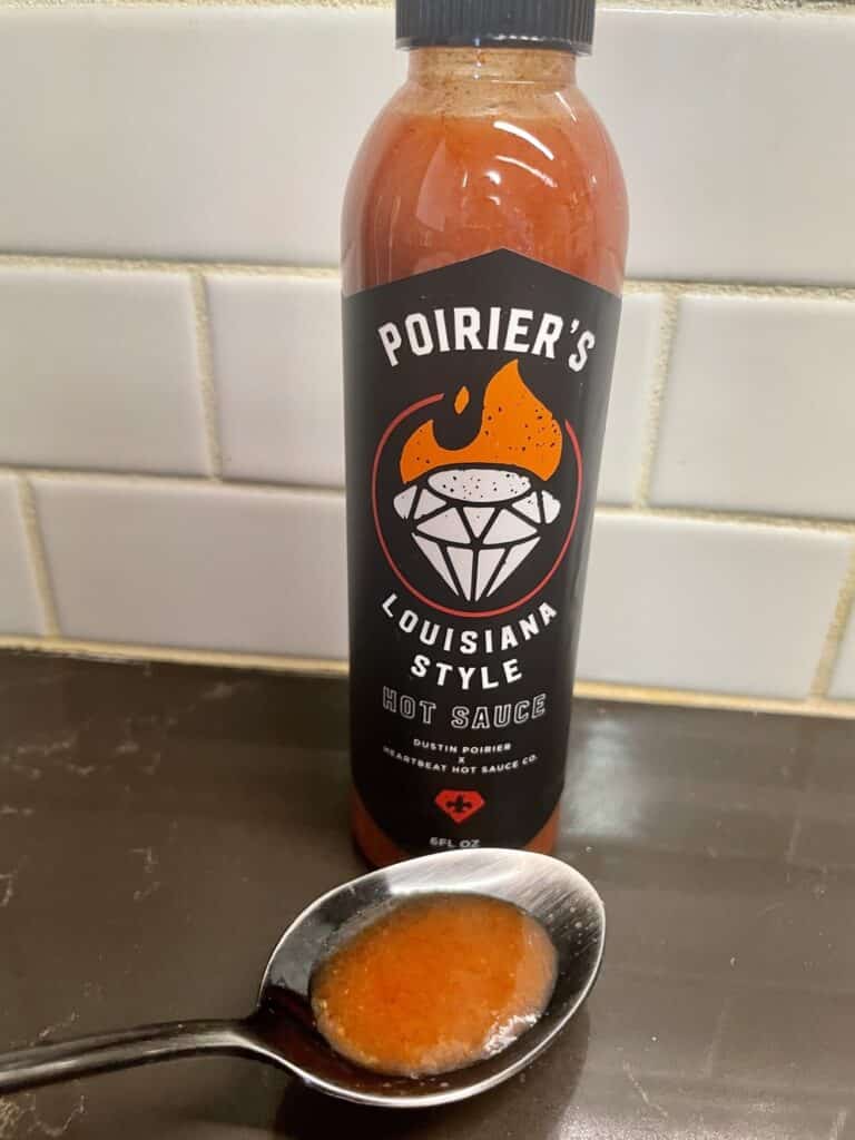 Poirier’s Louisiana-Style Hot Sauce on a spoon