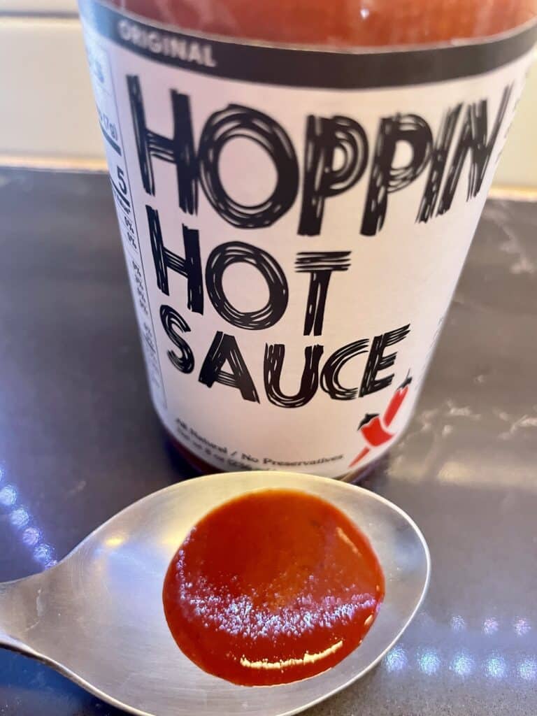 Hoppin Hot Sauce on a spoon