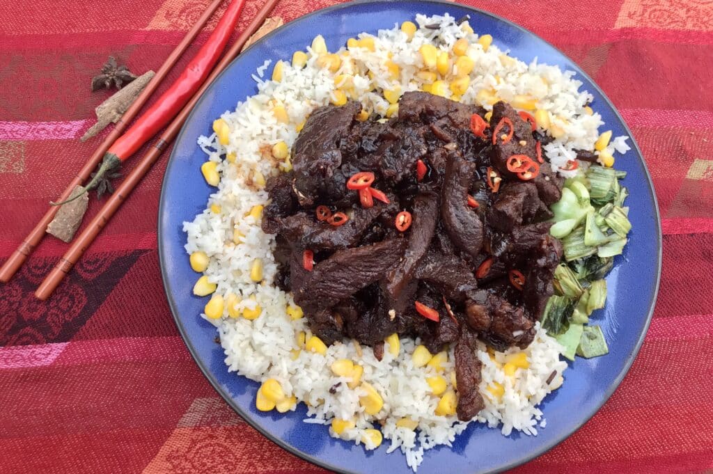 Indonesian Braised Beef With Spiced Rice (Dendeng Sapi Manis)