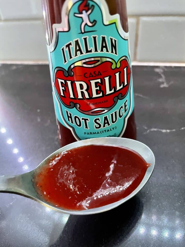 Casa Firelli Hot Sauce on a spoon