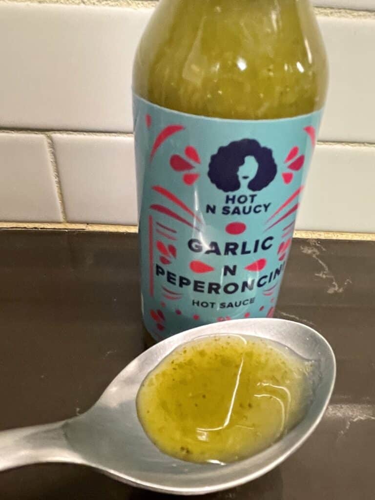 Hot n Saucy — Garlic n Peperoncini Hot Sauce on a spoon
